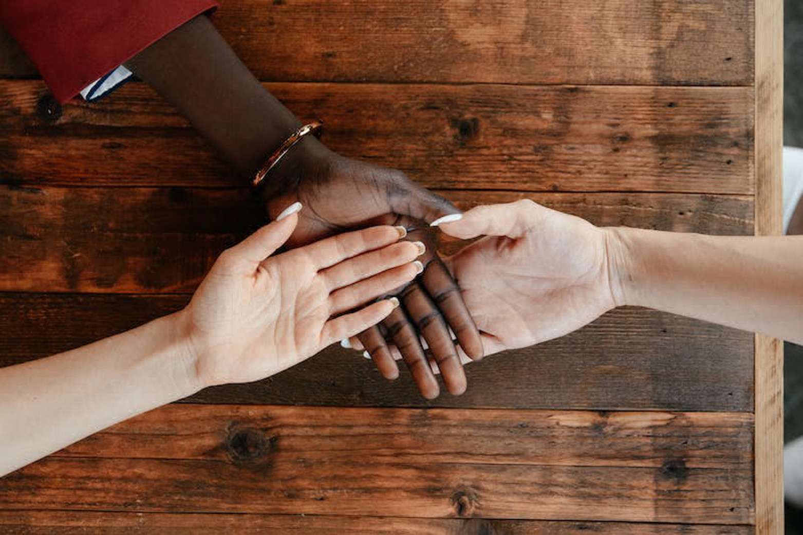 people holding hands